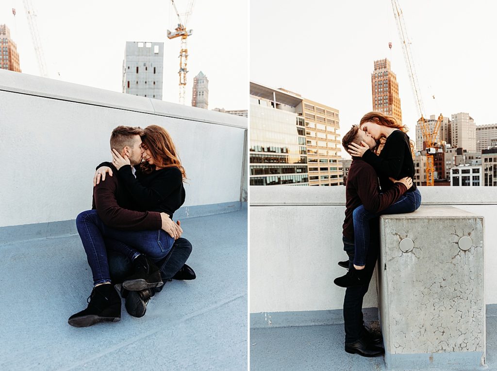 couple on rooftop kissing having fun