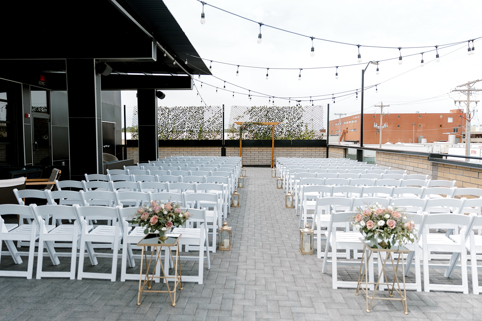 outdoor wedding aisle with flowers