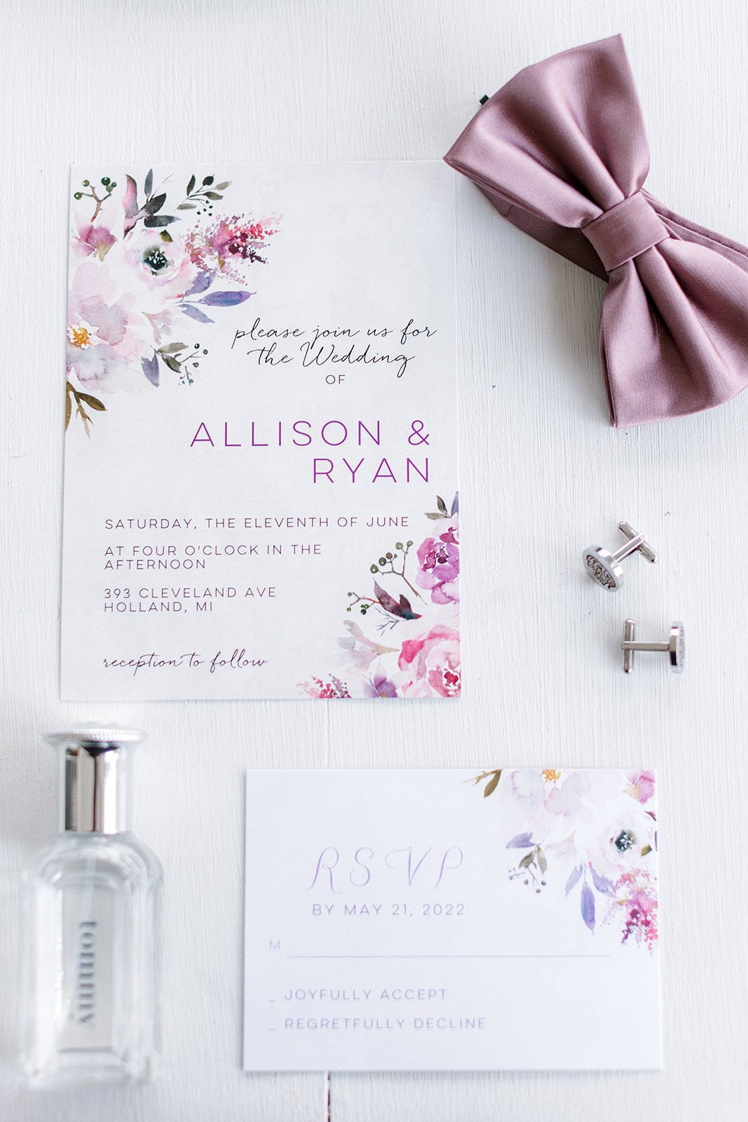 wedding detail picture of the invitation and perfume and cufflinks Port 393 Wedding In Holland, Michigan | Allie + Ryan