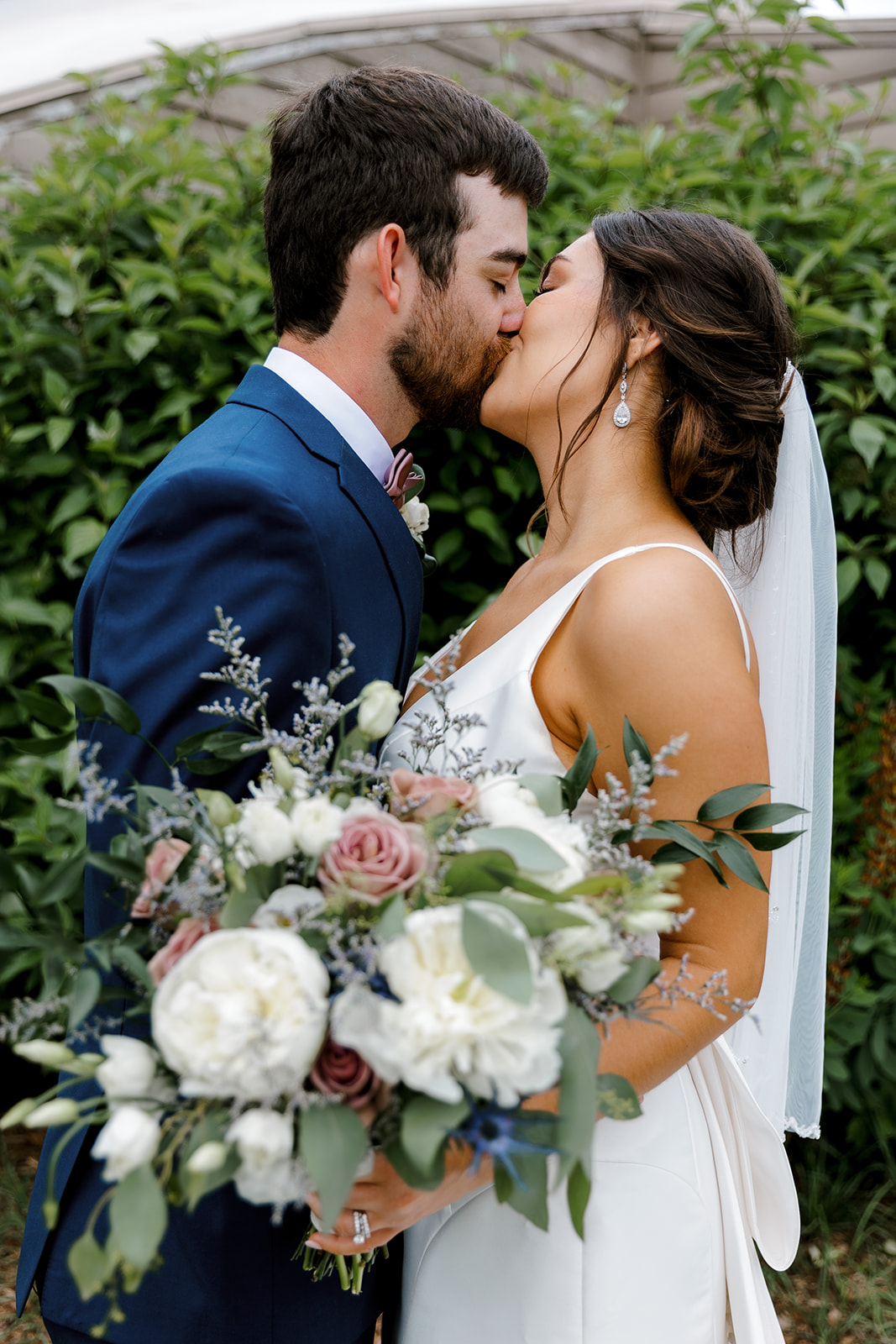 bride and groom kissing Port 393 Wedding In Holland, Michigan | Allie + Ryan