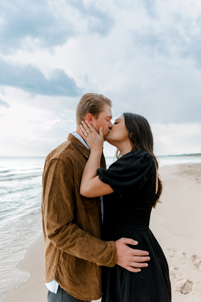 Romantic engagement session at Oval Beach in Michigan