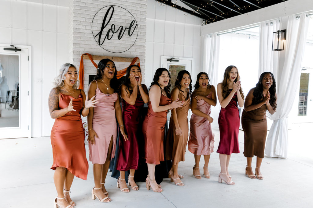brides first look with bridesmaids