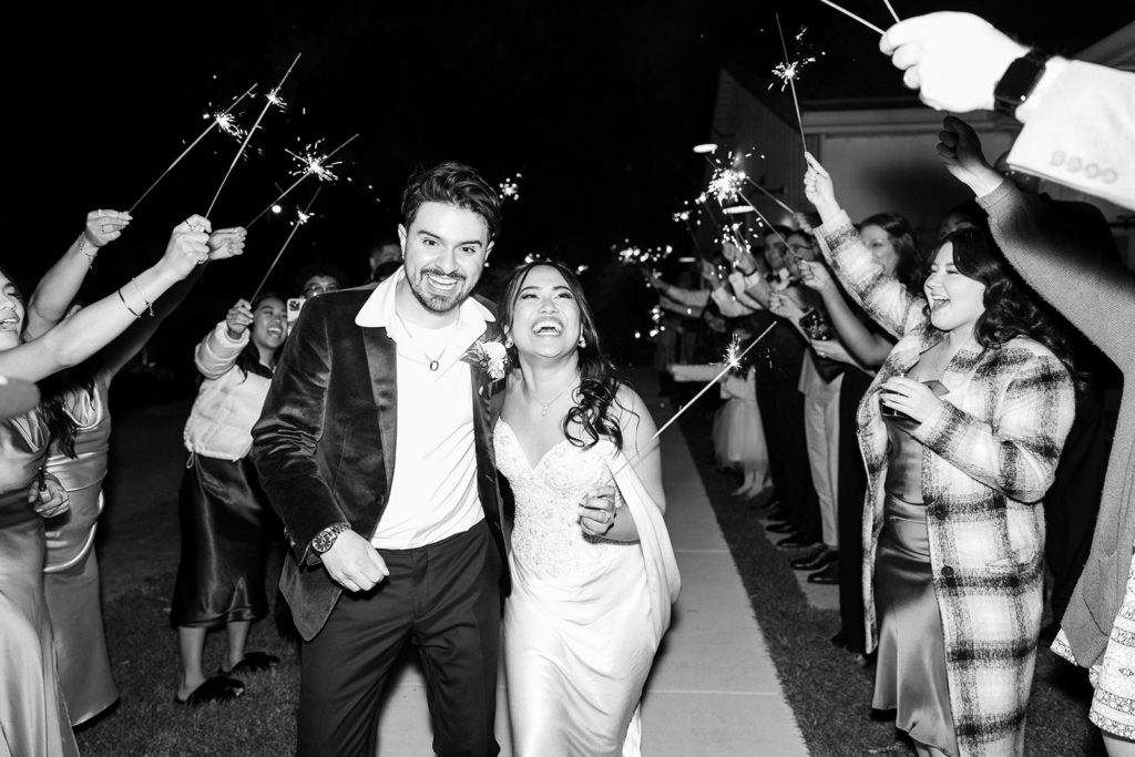 bride and grooms sparkler exit after wedding in mi