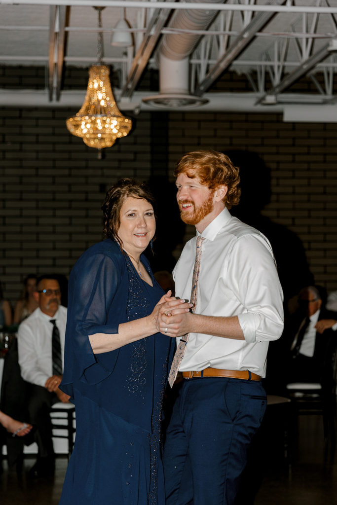 Groom and mothers first dance at Port 393 Holland wedding venue