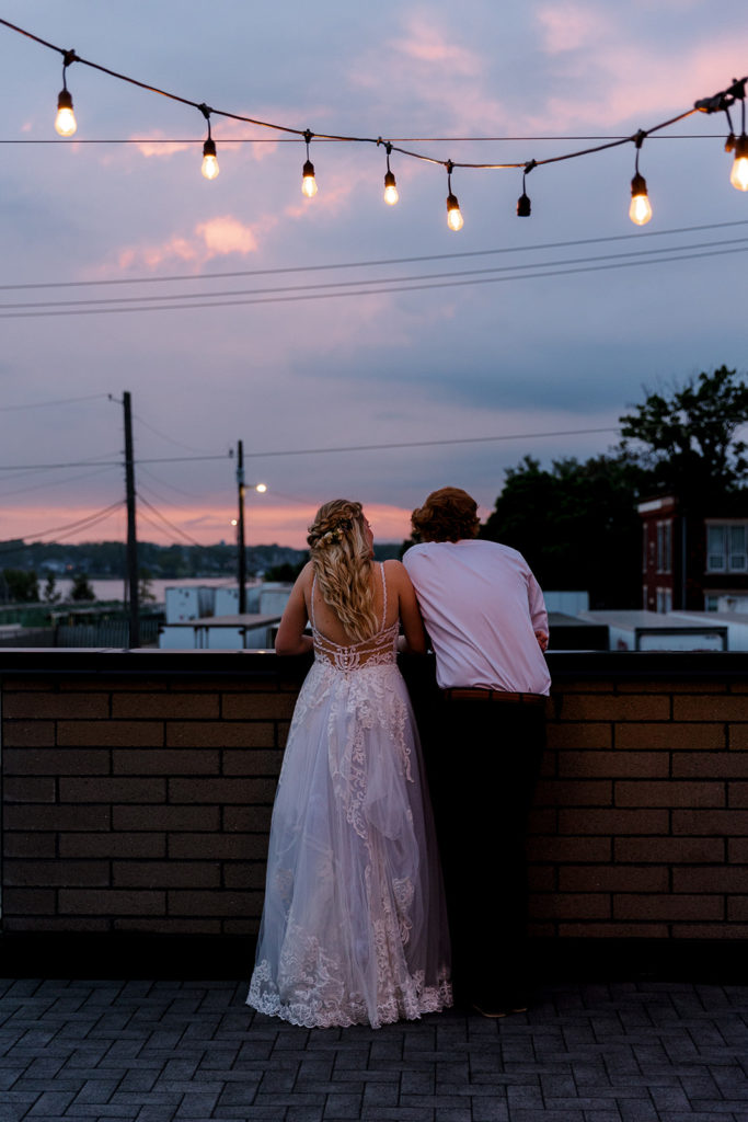Bride and groom on Port 393 rooftop Holland wedding venue