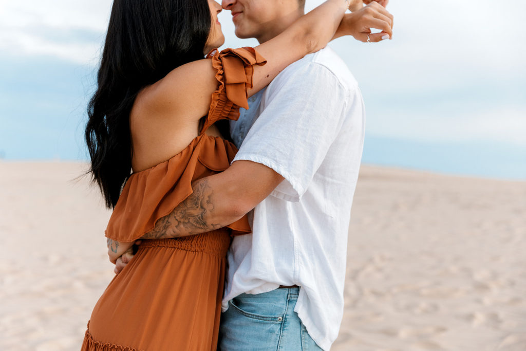 couple holding eachother during photoshoot