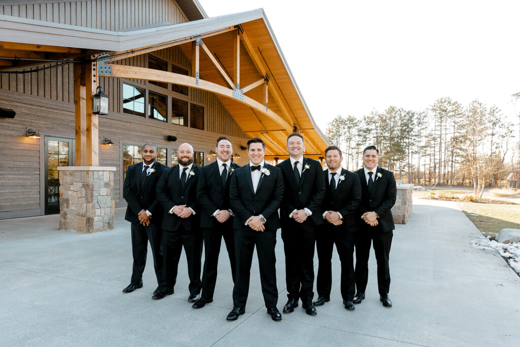 Groom and groomsman portraits at The Black River Barn - South Haven wedding venue