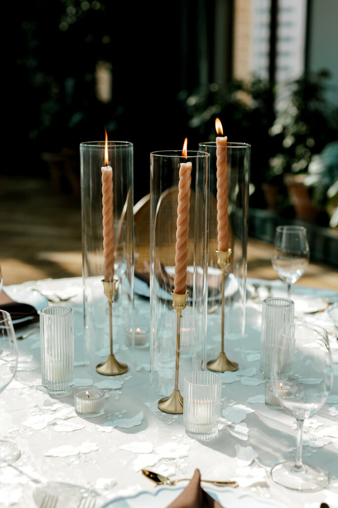 Twisted mocha taper candles on mocha-themed wedding tablescape