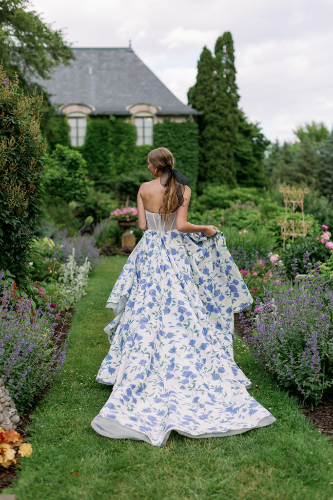 Bride walking through courtyard garden at Greencrest Manor
