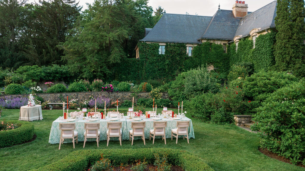 Wedding guests mingling on the manor’s European-style terrace