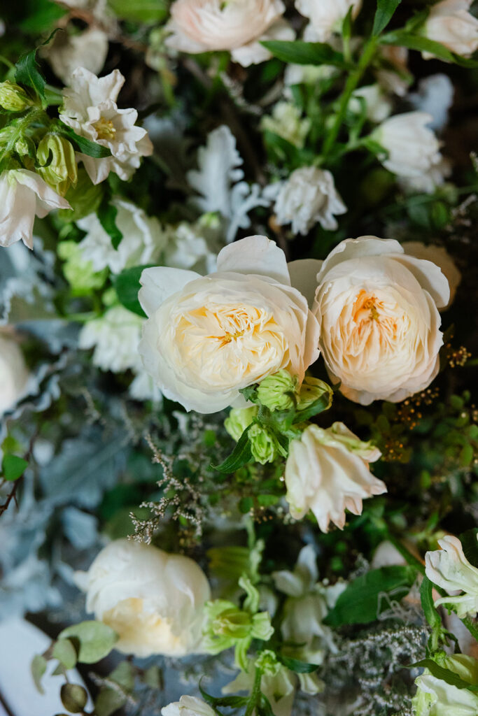 White roses for welcome party tablescape