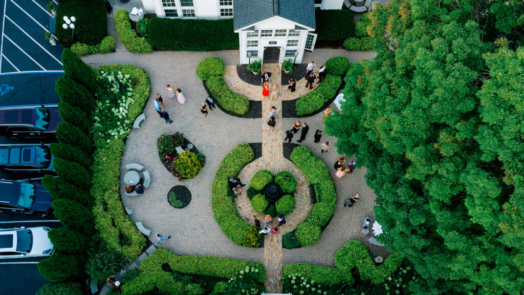 Aerial view of Michigan wedding venue courtyard, showcasing location, layout, and candid guest experience.